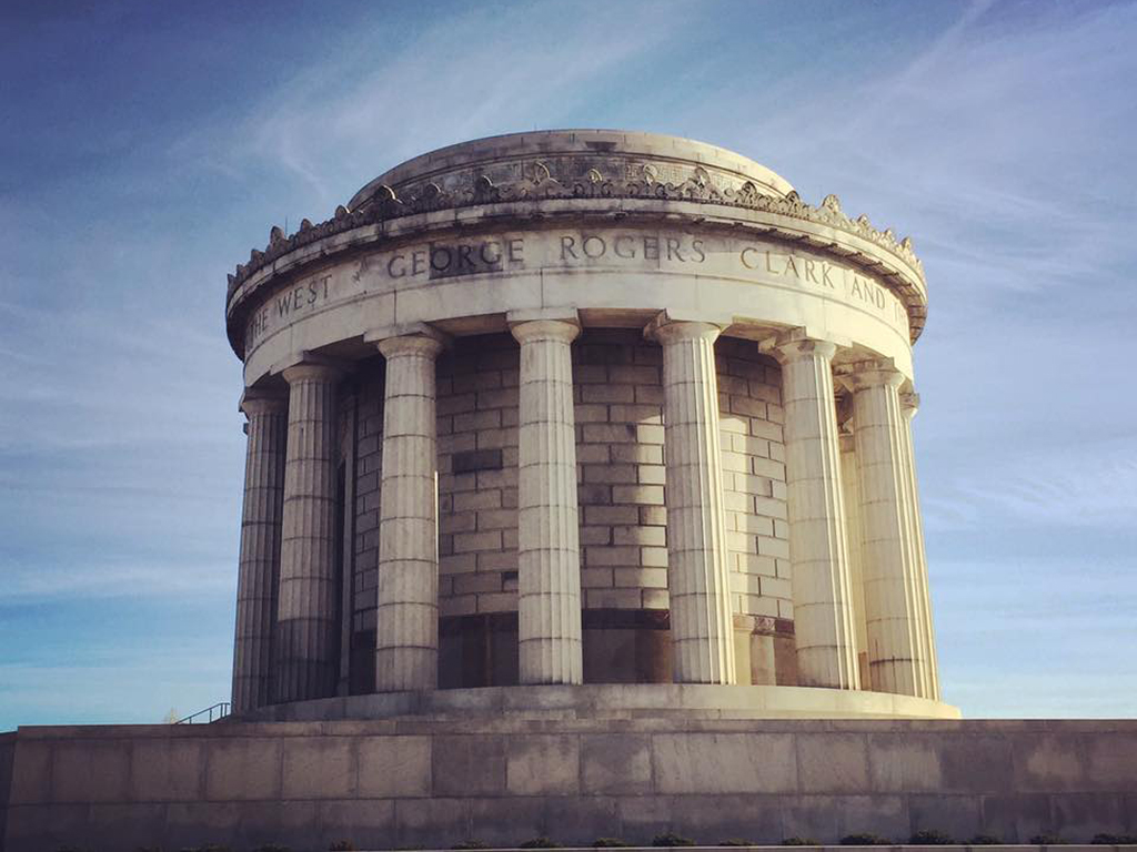 List of National Parks by State: A Complete List of All 400+ US National Parks 27 A circular monument with multiple columns against a cloudy blue sky