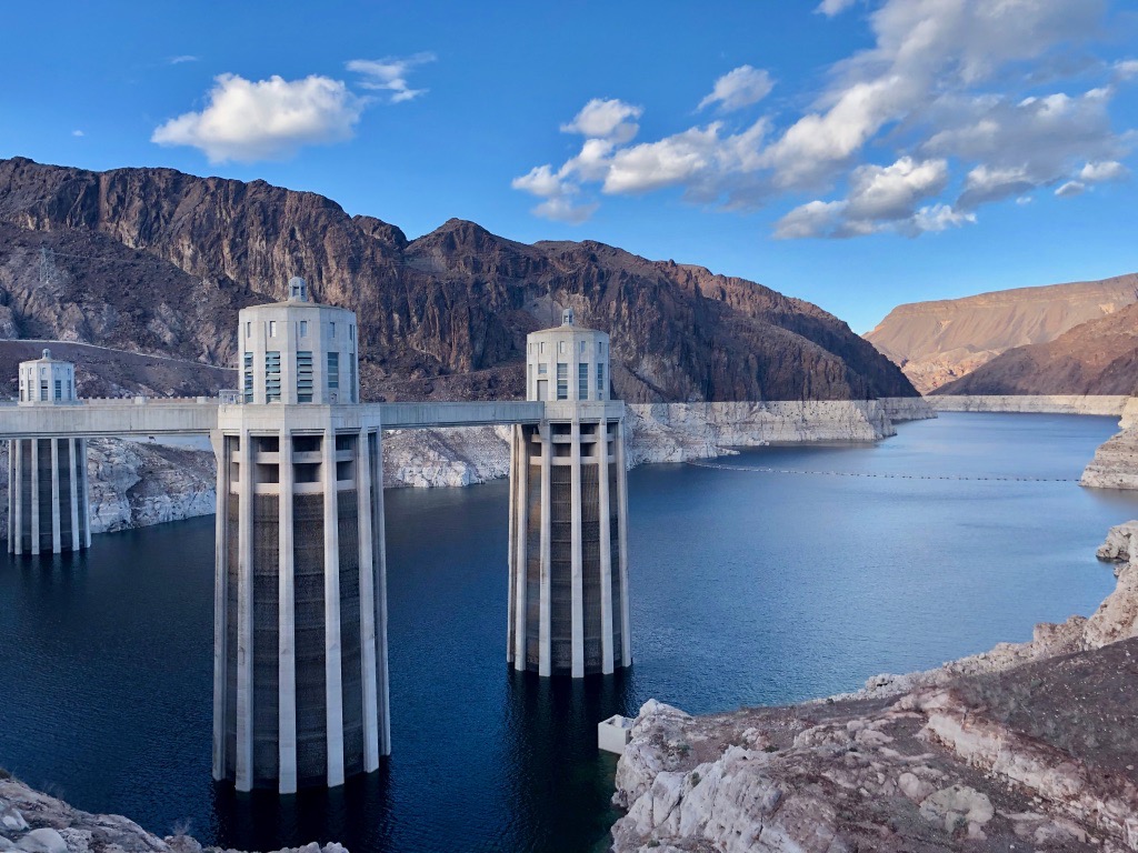 List of National Parks by State: A Complete List of All 400+ US National Parks 41 Two towers connect a bridge overlooking a dammed blue lake
