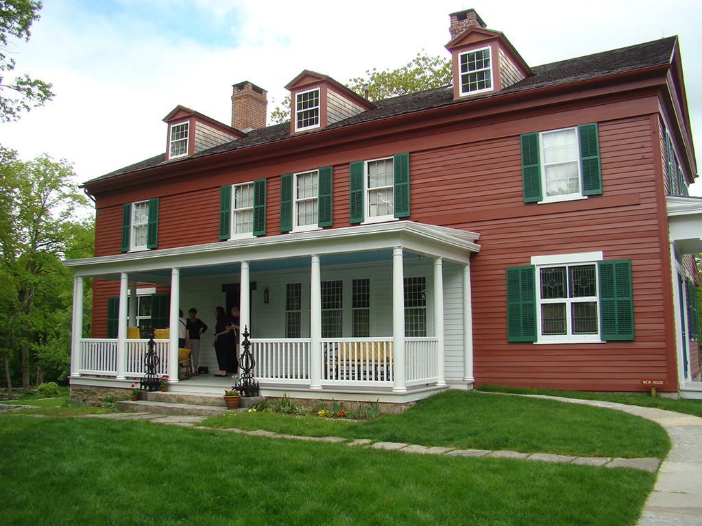 List of National Parks by State: A Complete List of All 400+ US National Parks 20 A red brick house with green shutters on the windows and a white porch
