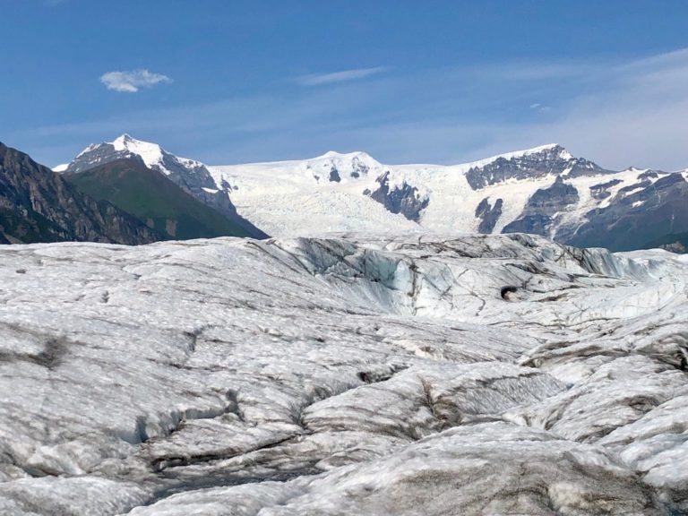 Brown, blue, and white lines throughout Root Glacier below the Stairway Icefall in Wrangell-St. Elias National Park
