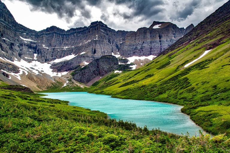 A turquoise blue lake, Cracker Lake, in Glacier National Park