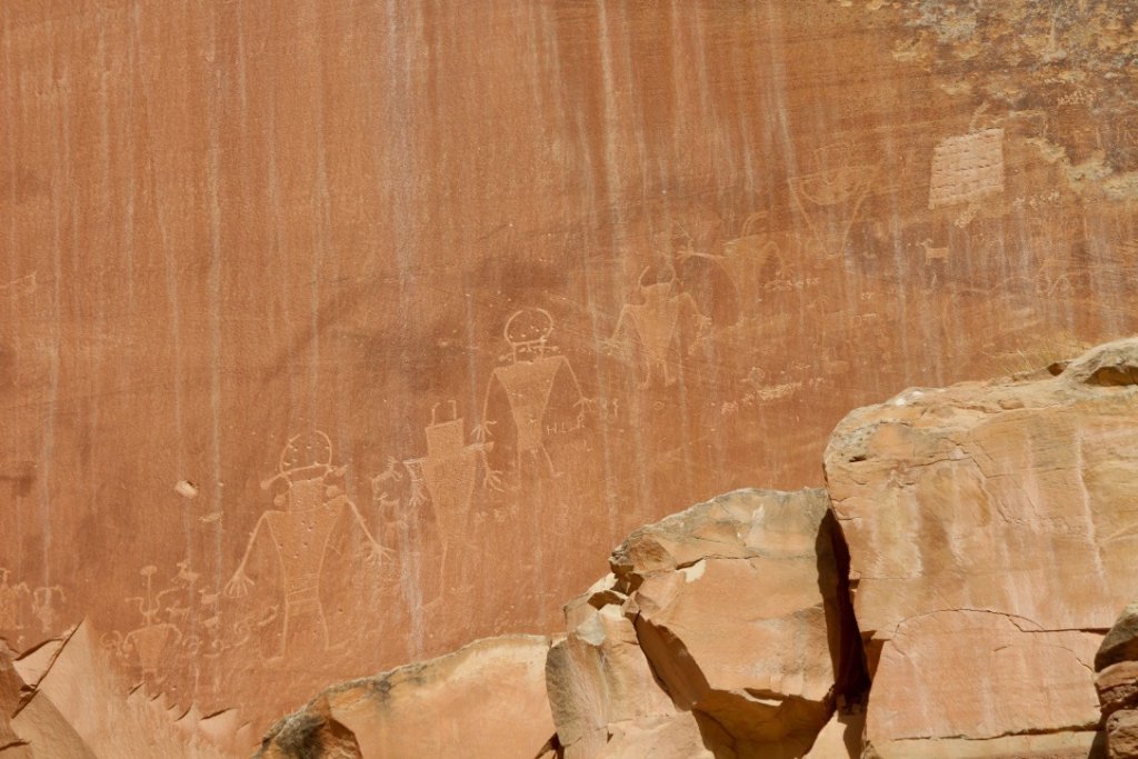 Visiting Capitol Reef National Park: The Expert Travel Guide 17 Petroglyphs on a red rock wall