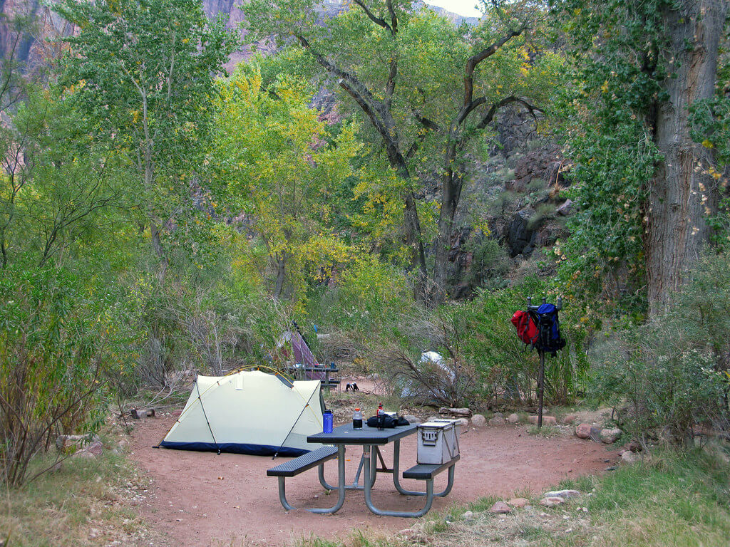 Visiting Grand Canyon National Park: The Expert Travel Guide 13 A tent at a picnic table in the Bright Angel Campground at the Grand Canyon