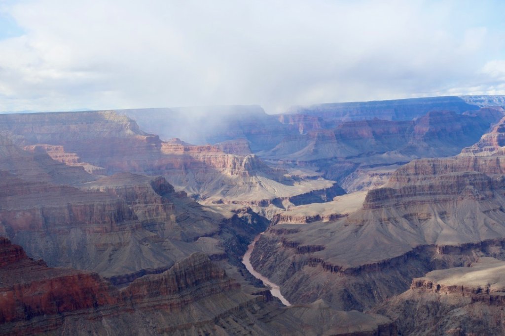 A List of All 63 National Parks in the U.S. Ranked by Their Popularity 21 Clouds over the Colorado River and Grand Canyon, one of the US national parks