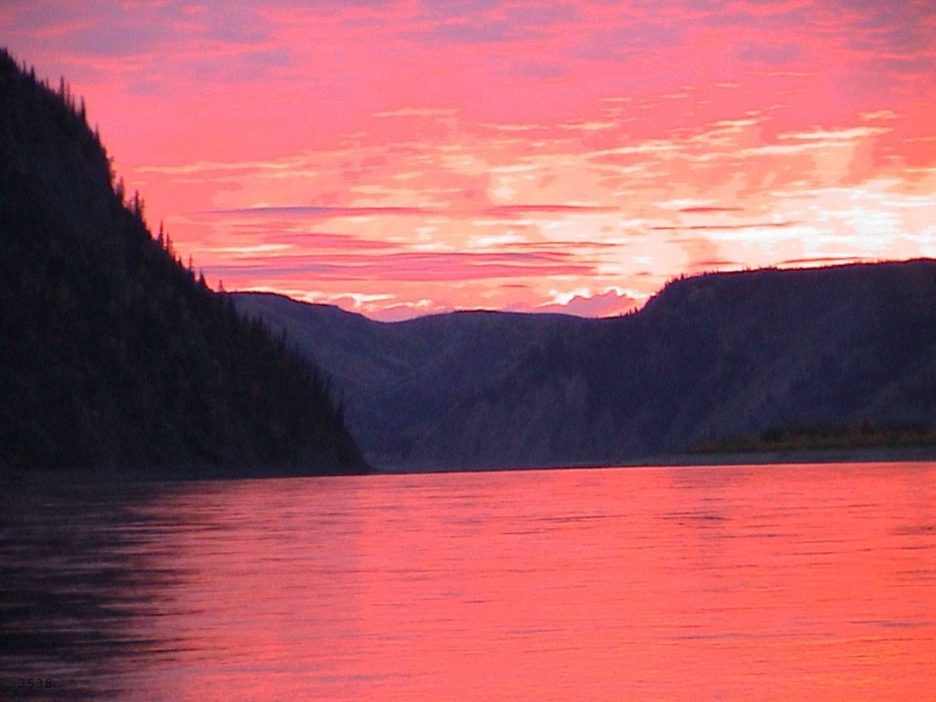 16 Astonishing National Parks in Alaska 20 A pink sunset reflected in Yukon Charley, one of the national parks in Alaska