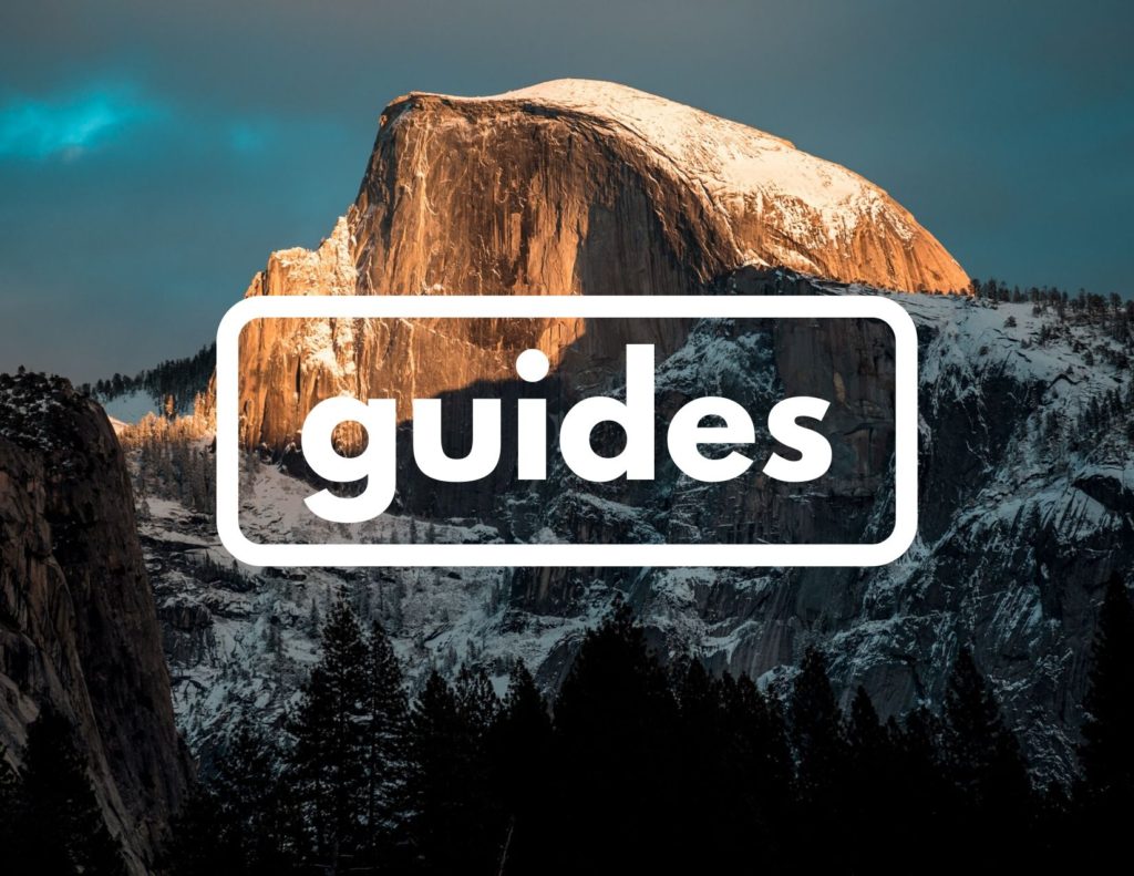 Plan 3 An image of a granite rock formation shaped like half of a dome. Across the center of the image is the word "guides" in white.