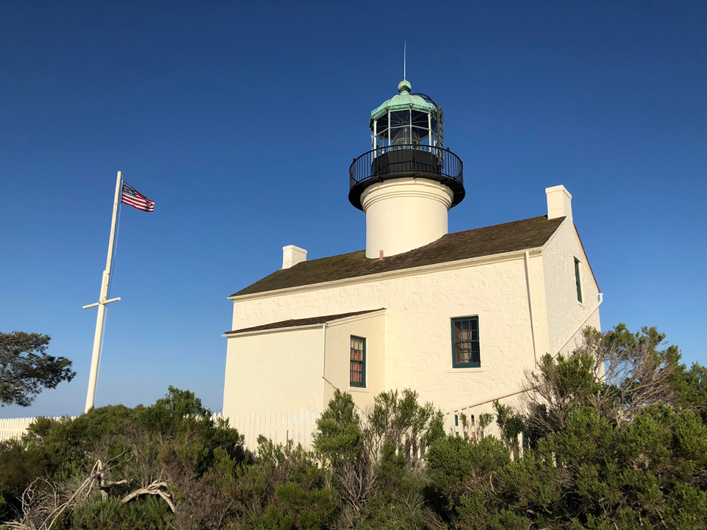 11-Day Southern California Road Trip: The Ultimate Itinerary 29 A small American flag outside a white lighthouse