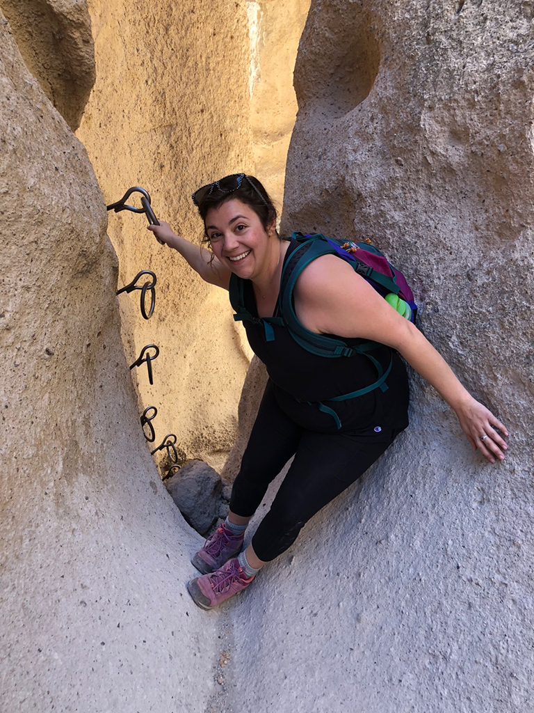 11-Day Southern California Road Trip: The Ultimate Itinerary 23 A woman climbs on metal rungs