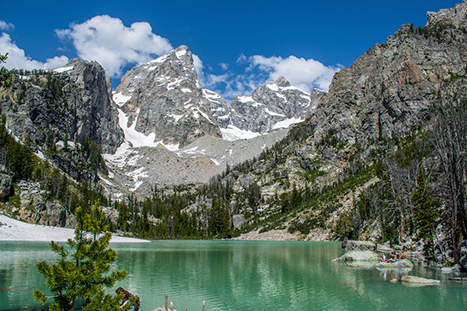Best Hikes in Grand Teton: The 14 Best Long Day Hikes and Multi-Day Hikes in Grand Teton National Park 32 A gorgeous turquoise lake below snow-capped mountains. Surprise Lake is one of the best hikes in Grand Teton.