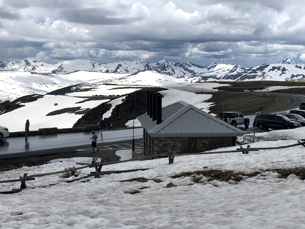Driving Trail Ridge Road in Rocky Mountain National Park: Everywhere You Should Stop on The Exhilarating Drive 14 Snow covers the ground near Trail Ridge Road