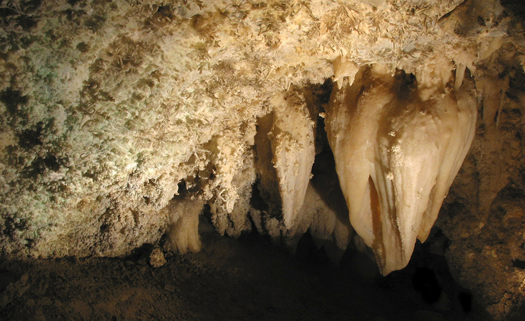 13 Unbelievable National Parks in Utah 76 White cave formations drip from the ceiling in Timpanogos Cave, one of the national parks in Utah