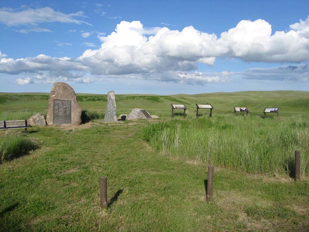 8 Marvelous National Parks in Montana 5 A monument and grave sites in a grassy field
