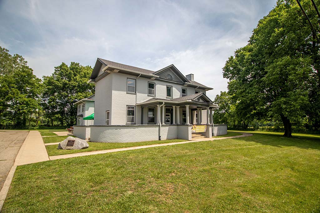 8 Outstanding National Parks in Ohio 5 A gray home on a pristine green lawn. This is one of the national parks in Ohio and the previous home of General Charles Young