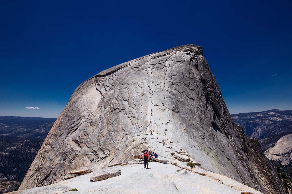 Yosemite Itinerary: 5 Ideas for Day-to-Day Experiences in an Iconic National Park 45 A hiker at the base of the cables used to ascend and descend Half Dome