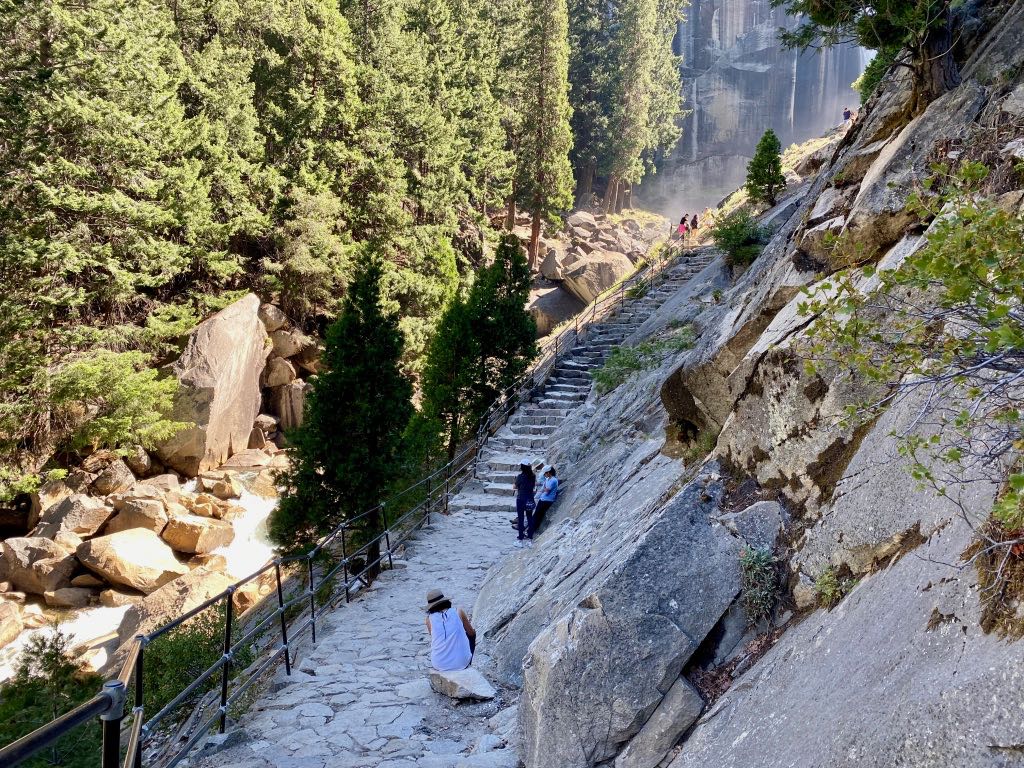 Hiking the Yosemite Mist Trail: Is It Worth the Climb? 32 Hikers rest at the bottom of the giant staircase on the Mist Trail
