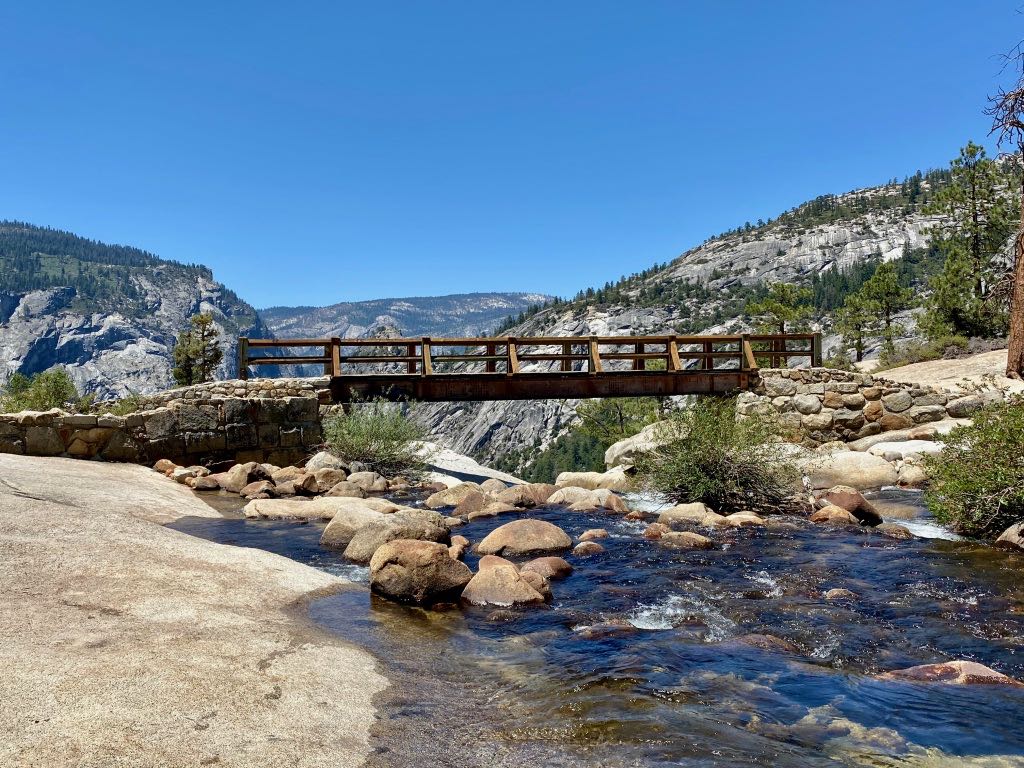 Hiking the Yosemite Mist Trail: Is It Worth the Climb? 42 A wooden footbridge over the Merced River at the top of Nevada Falls