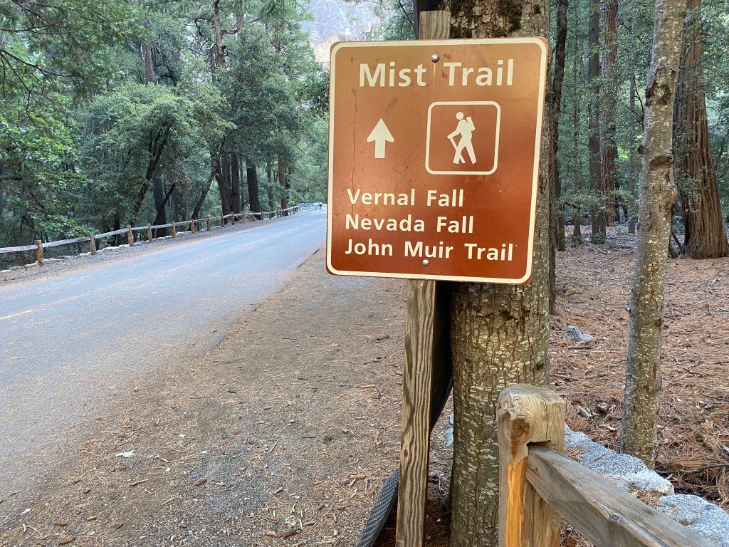 Hiking the Yosemite Mist Trail: Is It Worth the Climb? 29 A sign points straight ahead for Mist Trail, Vernal Fall, Nevada Fall, and the John Muir Trail