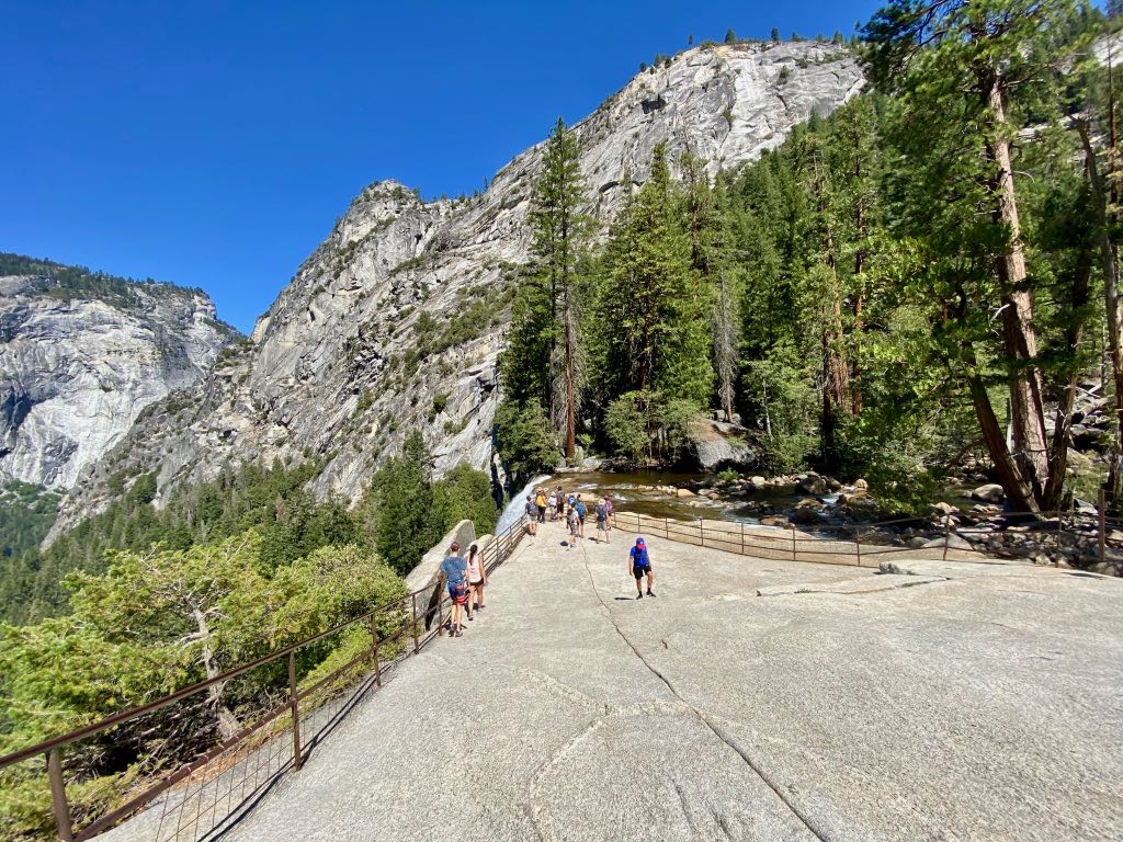 Hiking the Yosemite Mist Trail: Is It Worth the Climb? 36 A wide angle of a viewing platform made of granite near the top of Vernal Falls in Yosemite