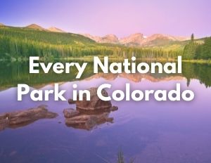 Rocky Mountain National Park 4 Green and gray mountains reflected in a lake during a purple sunset. Over the image, white text says "Every National Park in Colorado"