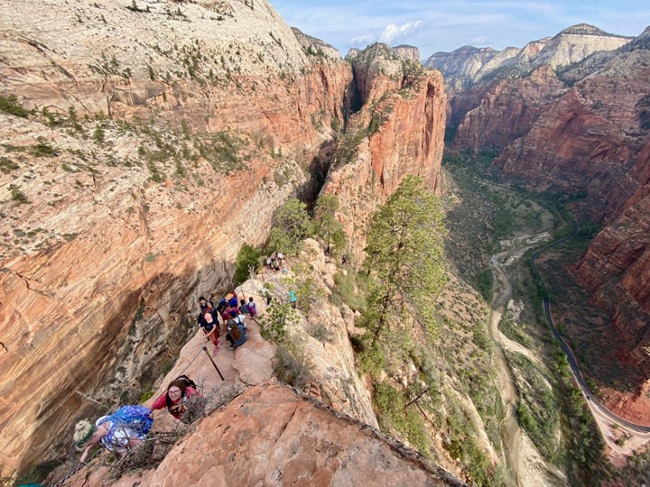 Perilous But Worth It: How to Safely Conquer the Angels Landing Hike in Zion National Park 36 A group of hikers on a narrow ledge on the Angels Landing hike
