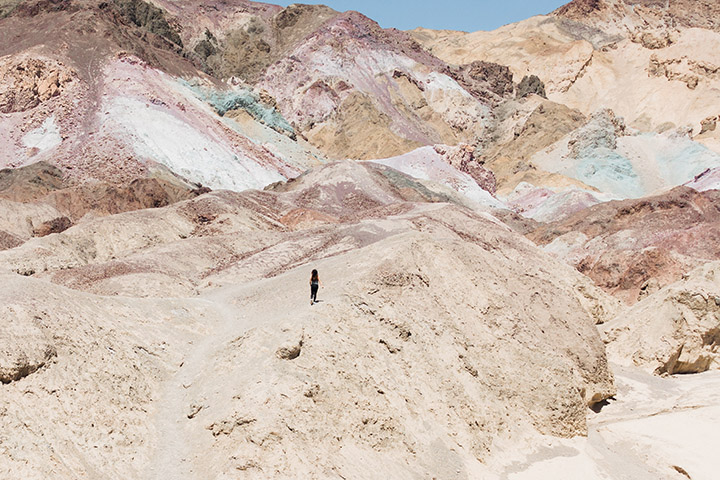 2 Day Death Valley Itinerary: How to See the Best of the West in 2 Days 30 A hiker walks across the artists's palette in Death Valley