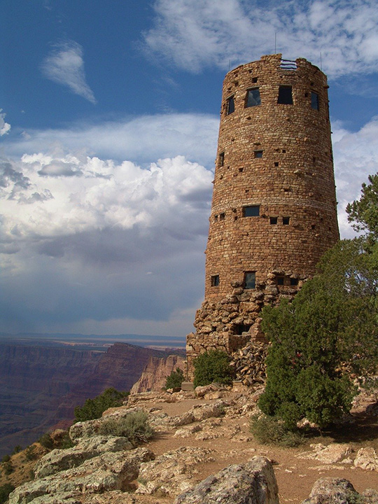 13 Inspiring Things to Do in Grand Canyon National Park 18 A stone building stands tall on the rim of the Grand Canyon