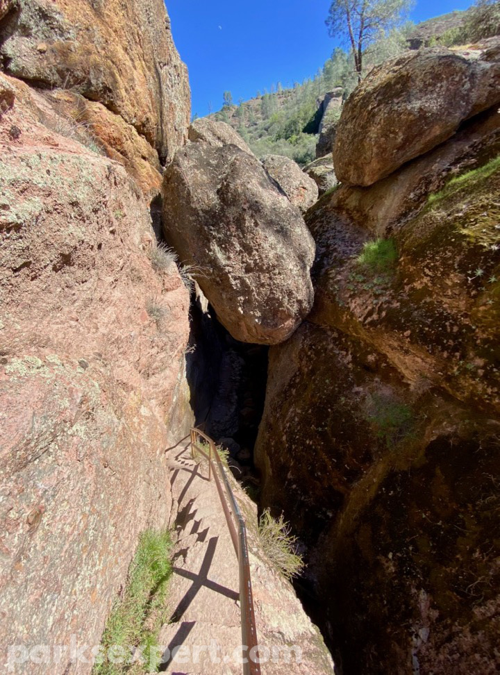14 Phenomenal Things to Do in Pinnacles National Park 9 A stone stair case descends into a cave