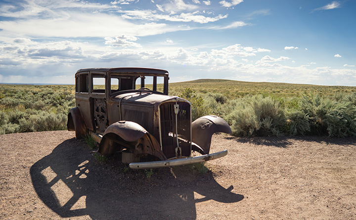 How to Spend One Day in Petrified Forest National Park Itinerary 21 The metal body of an old Studebaker car seen while spending one day in Petrified Forest National Park