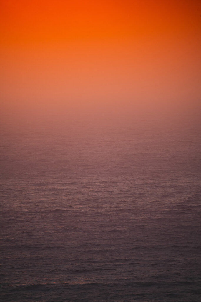 Alamere Falls Hike: The Ultimate Guide for Hiking to One of California’s Bucket-List Waterfalls 13 A pink and orange sunset over the ocean