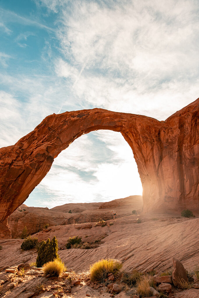 Arches National Park 17 A large red sandstone arch on a partly cloudy day