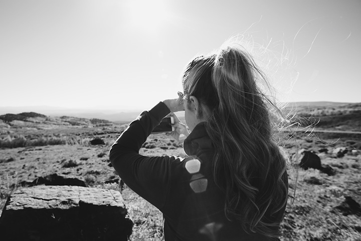 Ultimate Guide to an Epic One Day in Arches National Park Itinerary 66 A black and white photo of a woman in the desert