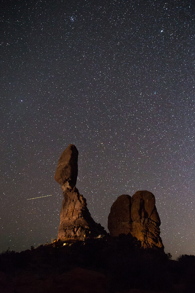 Arches National Park 21 Stars above Balanced Rock, one of the best things to see if you only have one day in Arches National Park