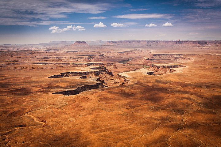 The 15 Best Hikes in Canyonlands National Park: A Comprehensive Guide 7 A river runs through a canyon