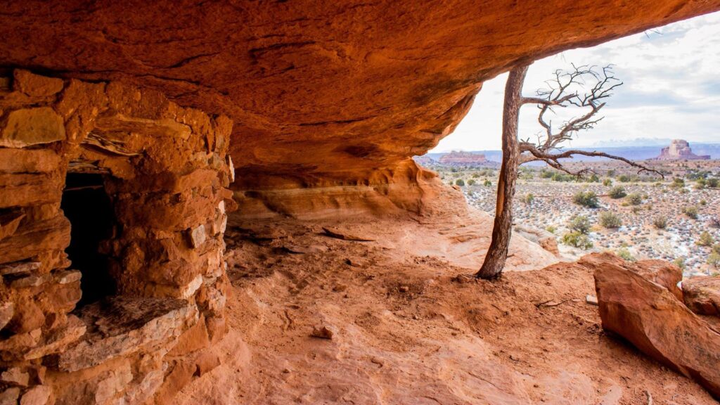 The 15 Best Hikes in Canyonlands National Park: A Comprehensive Guide 34 A stone structure tucked into an overhanging canyon
