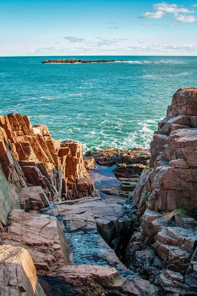The Best Time to Visit Acadia National Park: When to See Fall Colors 22 Ocean waves crash up a rocky shoreline