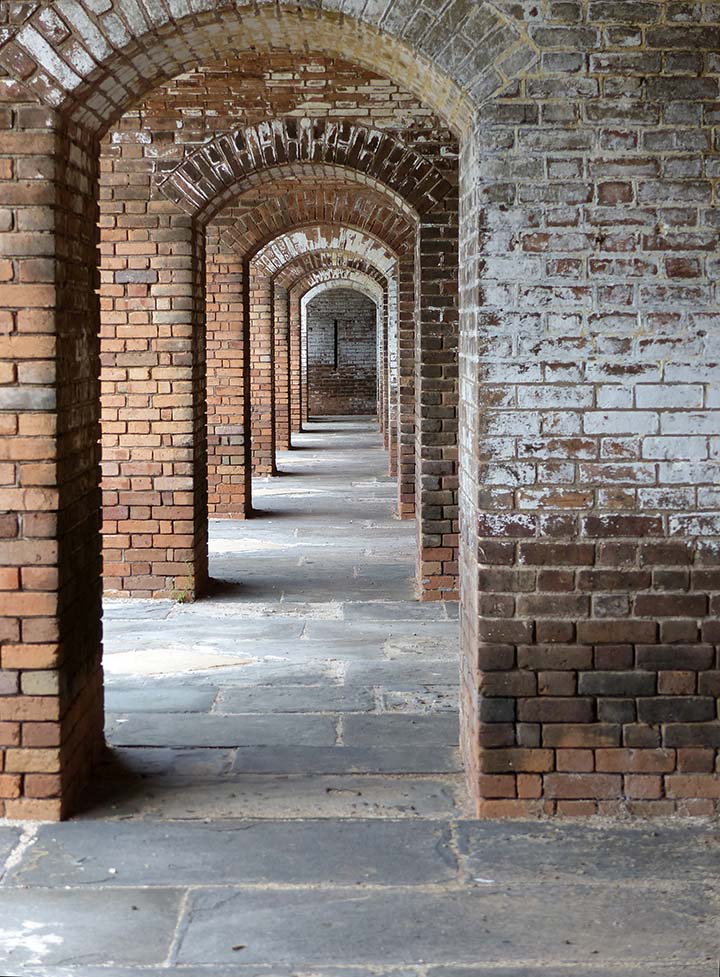 The Absolute Best Time to Visit Dry Tortugas National Park 2 Brick archways down a hallway