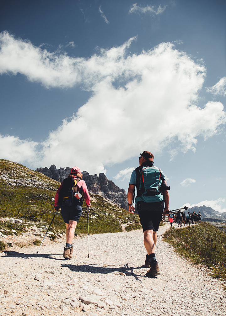 11 Hiking Safety Tips for Your Next Trail Adventure 12 Two hikers walk a trail in the mountains