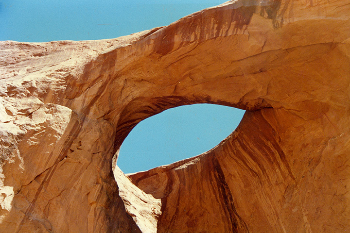 Ultimate Guide to an Epic One Day in Arches National Park Itinerary 10 A sandstone arch beneath a clear blue sky