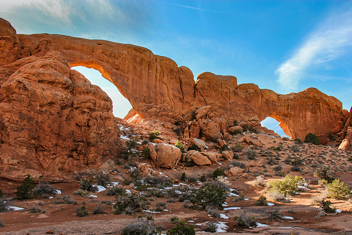 Ultimate Guide to an Epic One Day in Arches National Park Itinerary 29 A sandstone arch beneath a clear blue sky