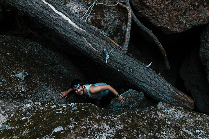 The Ultimate Pinnacles National Park Camping Guide 11 A man climbs through the talus caves in Pinnacles National Park