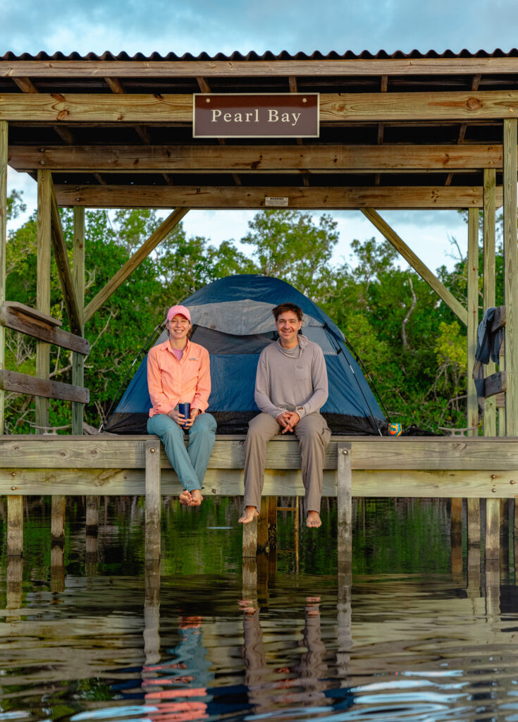 Everglades National Park Camping Guide: Everything You Need to Know 24 Two campers sit on the Pearl Bay Chickee, one of many backcountry options for Everglades National Park camping