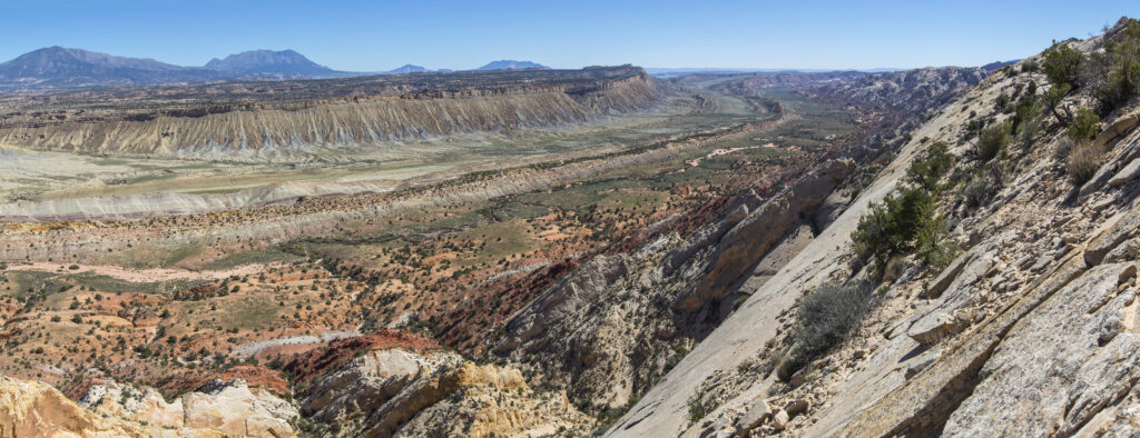 20 Best Hikes in Capitol Reef National Park 21 A panoramic view of a desert canyon from an overlook