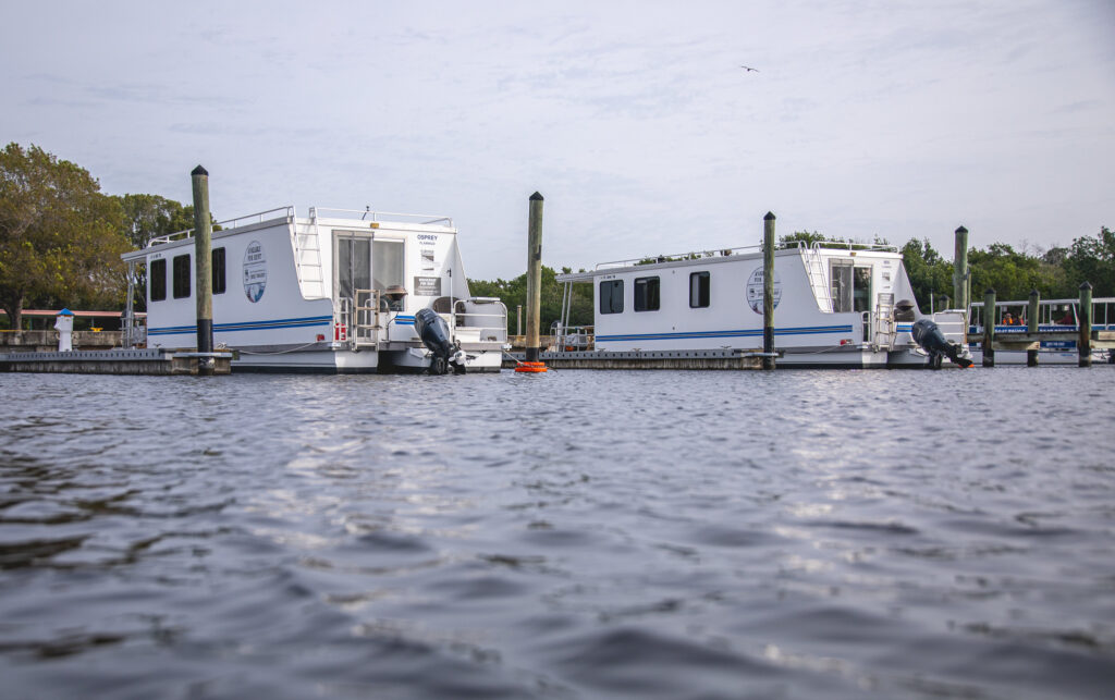 Everglades National Park Camping Guide: Everything You Need to Know 26 Two white houseboats docked in the Flamingo Marina in Everglades National Park
