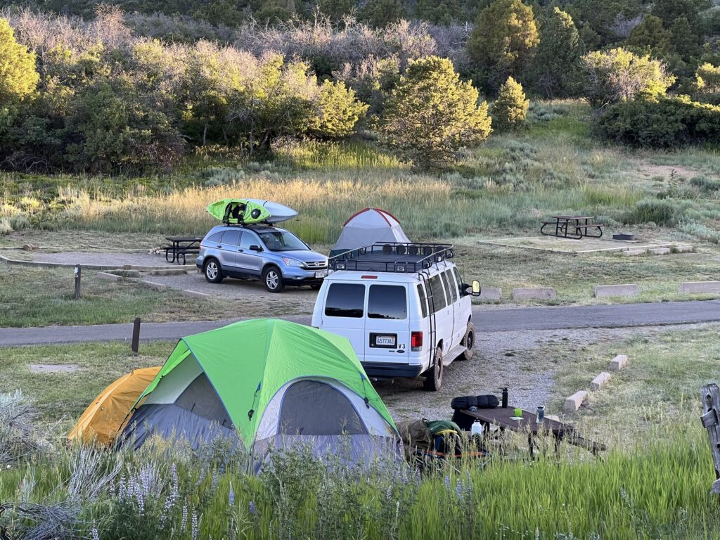 Camping in Mesa Verde National Park: Is Morefield Campground the Best in the National Parks? 12 Tents, RVs, and vehicles parked at campsites in Mesa Verde National Park