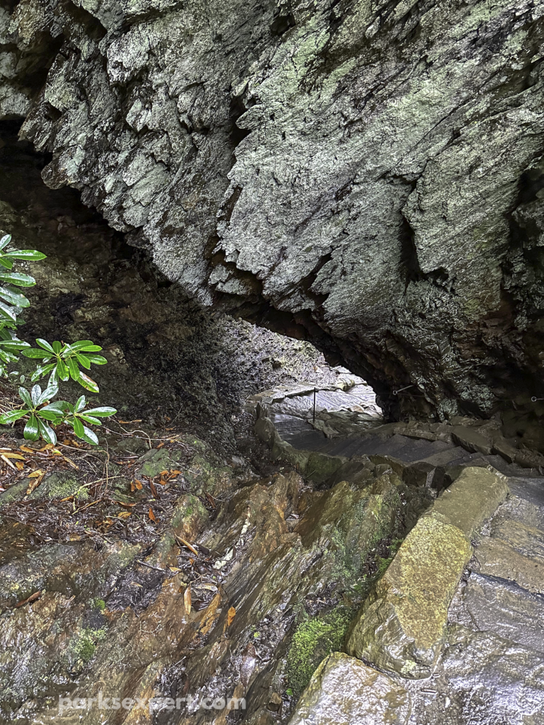 Hiking Alum Cave Trail in Great Smoky Mountains National Park 15 Stone stairs descend under a rock tunnel
